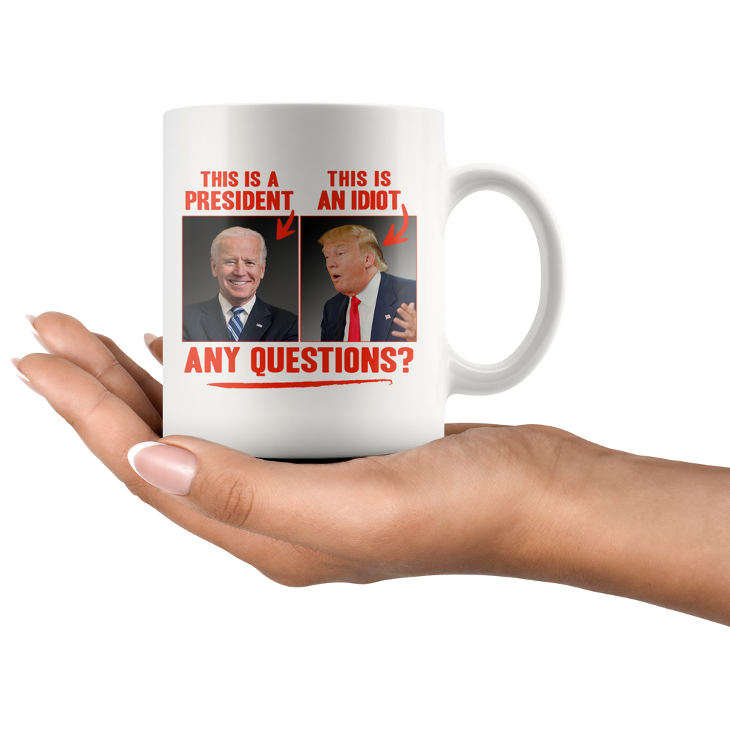 This (Biden) is a President, This (Trump) is an Idiot - Any Questions? (White Mug)